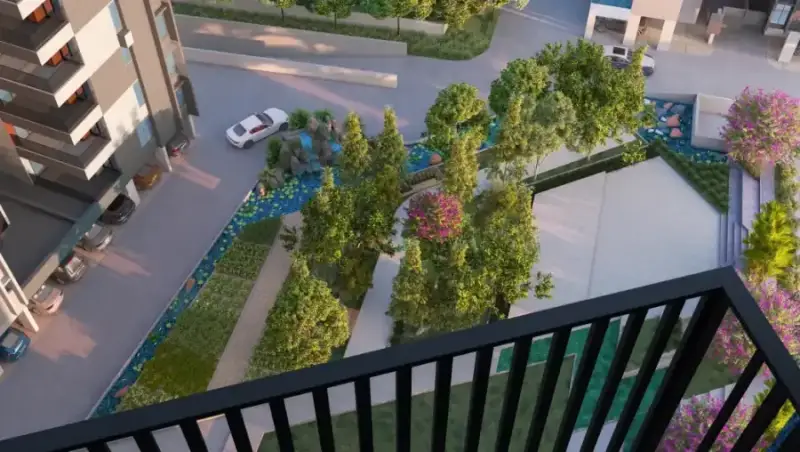 Balcony view over landscaped gardens at Suraksha Whispering Waves, Begur